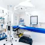 Hospital interior with operating surgery table,